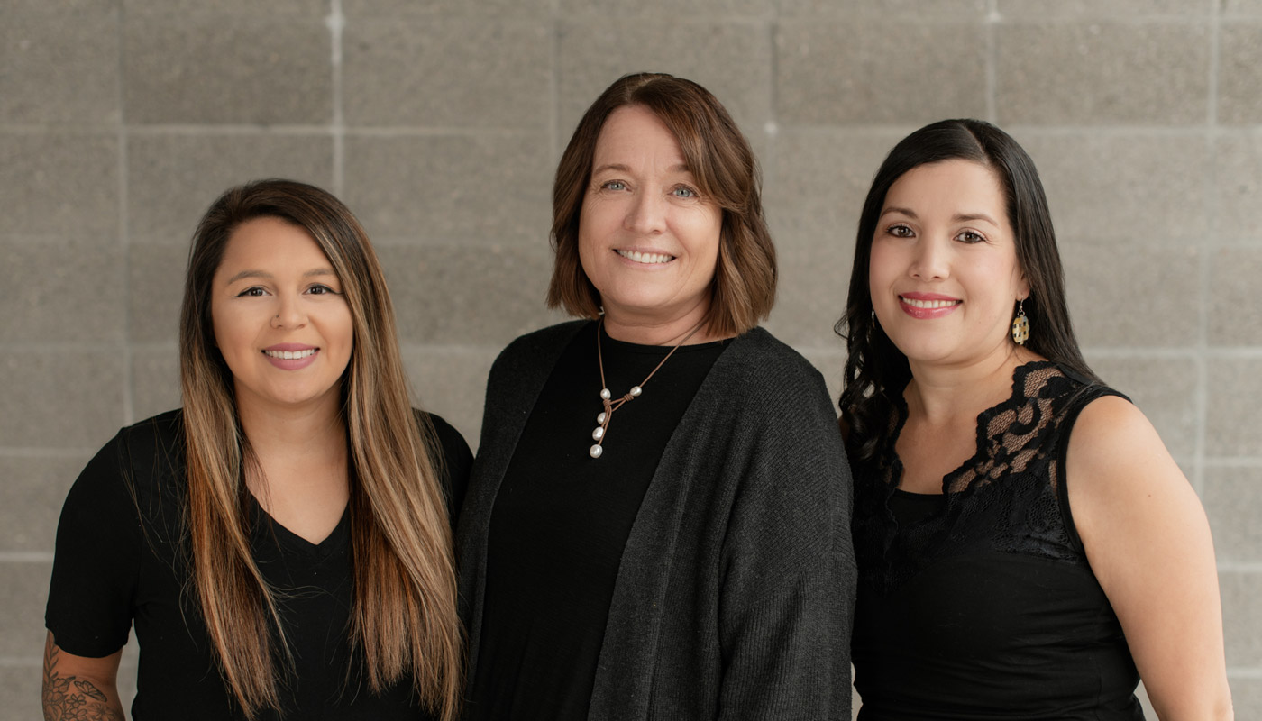 Dr Kara Hobson DDS MS with staff